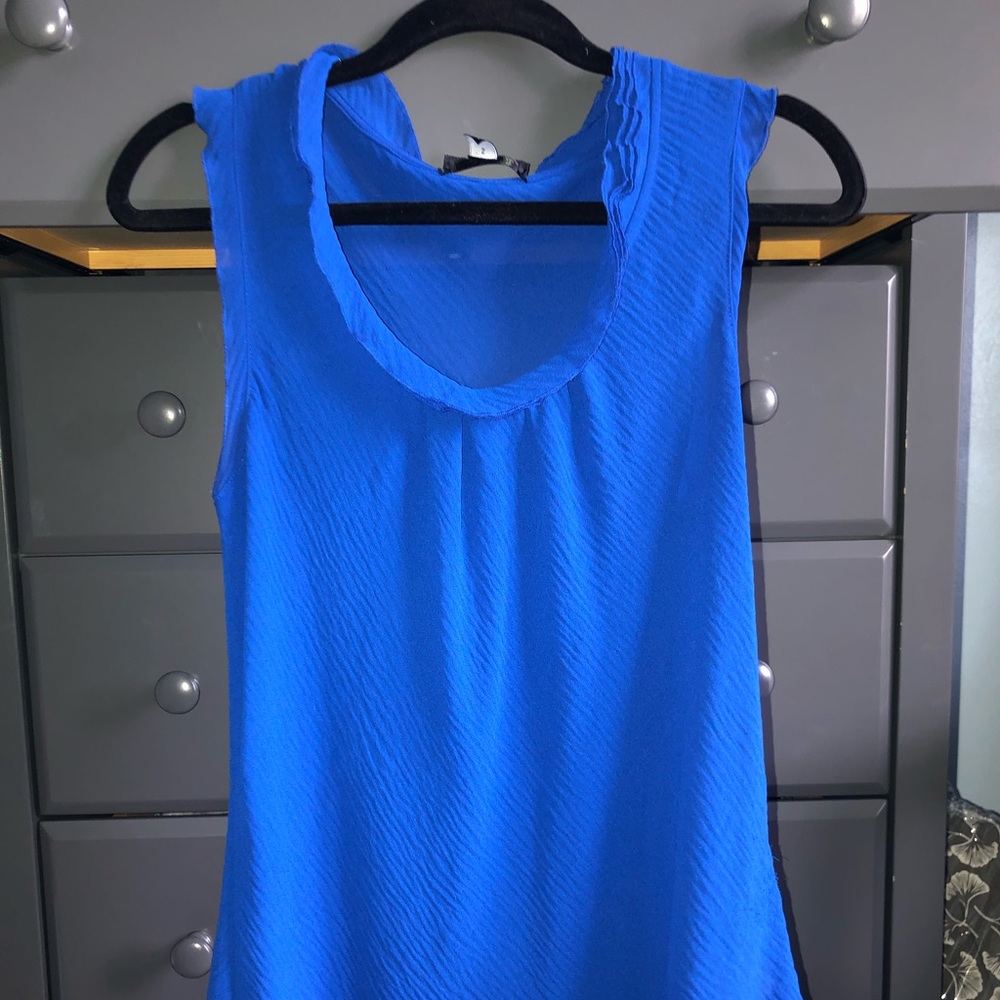 Bright blue sleeveless blouse